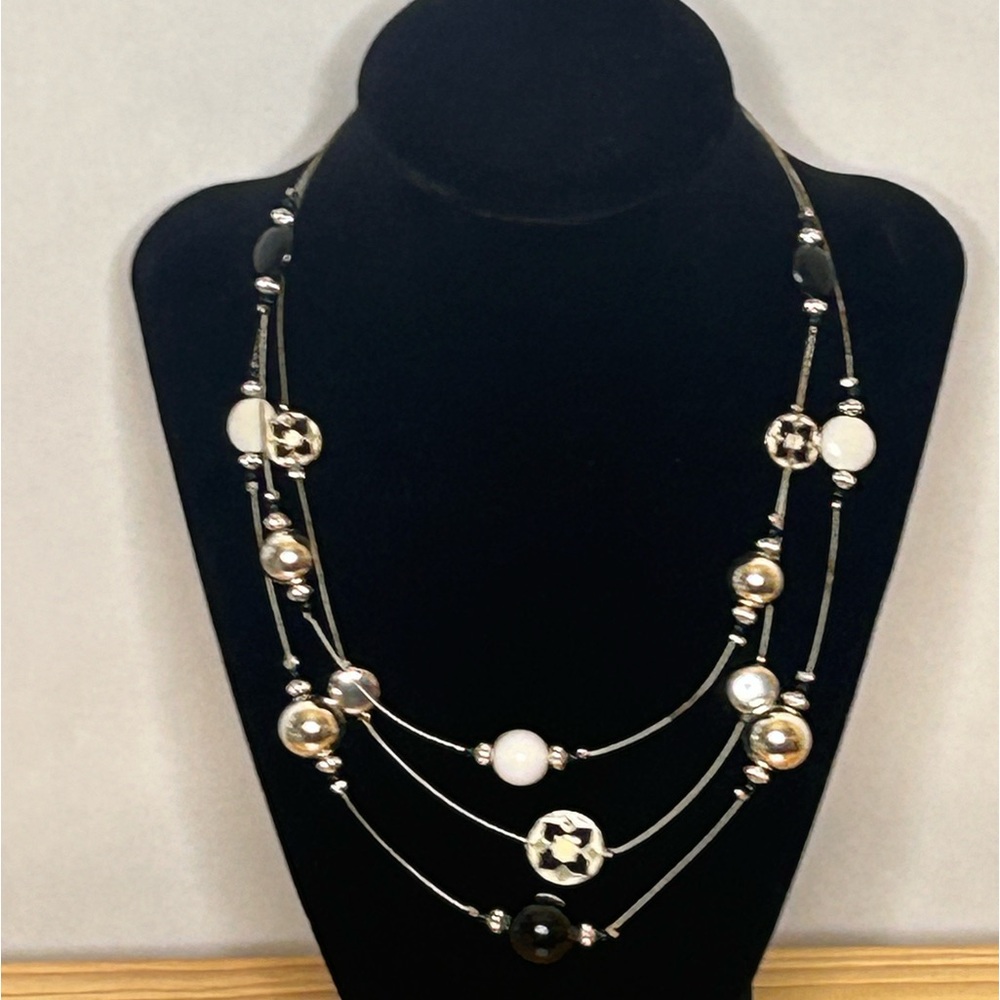Elevate your style with this 3 strand stunning beaded necklace!
